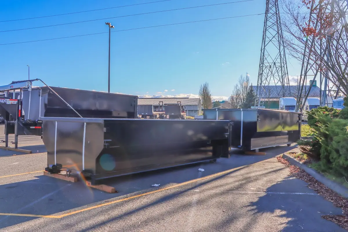 Roll-off dumpster ready for waste disposal at job site for 2 Yard Dumpster Rental in Crystal